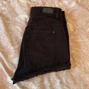 Black denim shorts